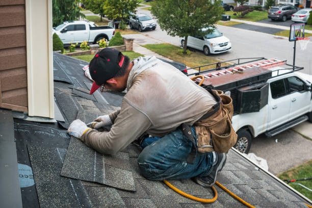 Professional Roofing technician working in Milford, VA